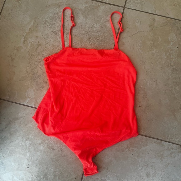 Parade Tops - Neon Orange Exclusive Parade Bodysuit